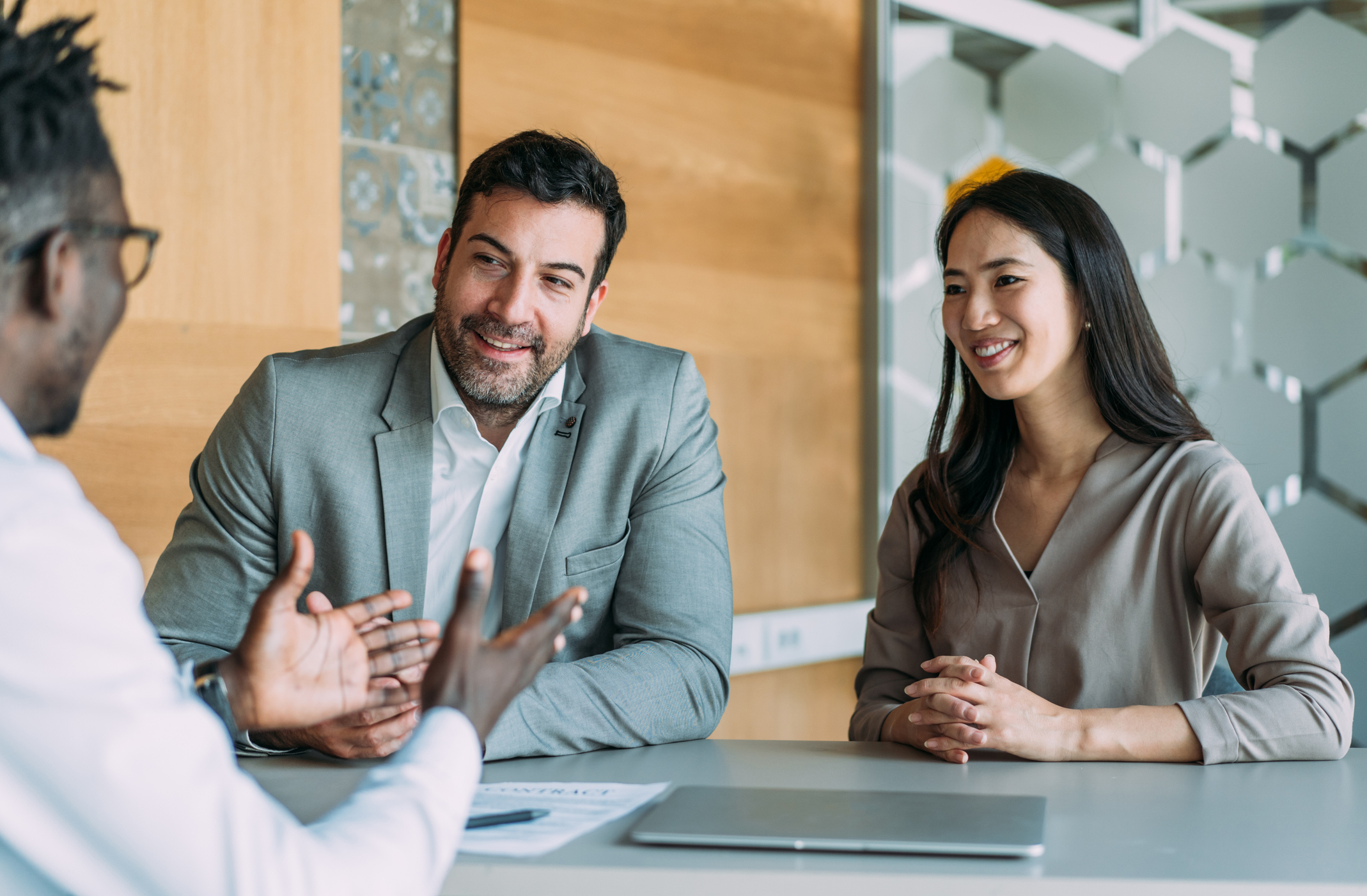 Image - three people in a meeting
