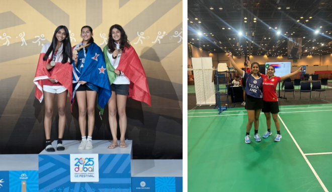 The winners standing with their flags during the medal ceremony