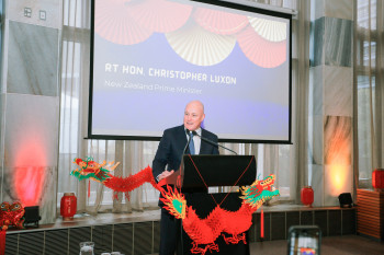 Image: Rt Hon Christopher Luxon, Prime Minister standing at the podium